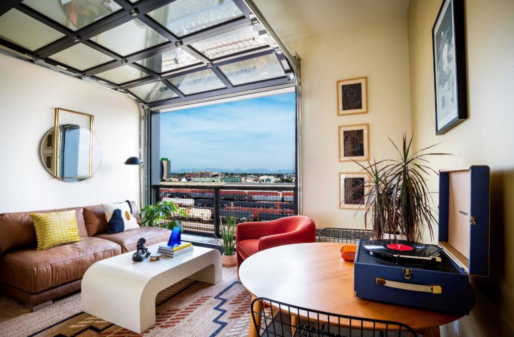pov of living room with wide open patio area