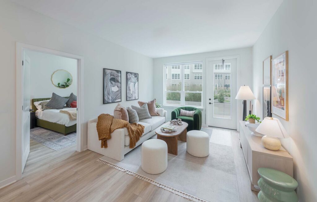 spacious and open living room leading into the bedroom