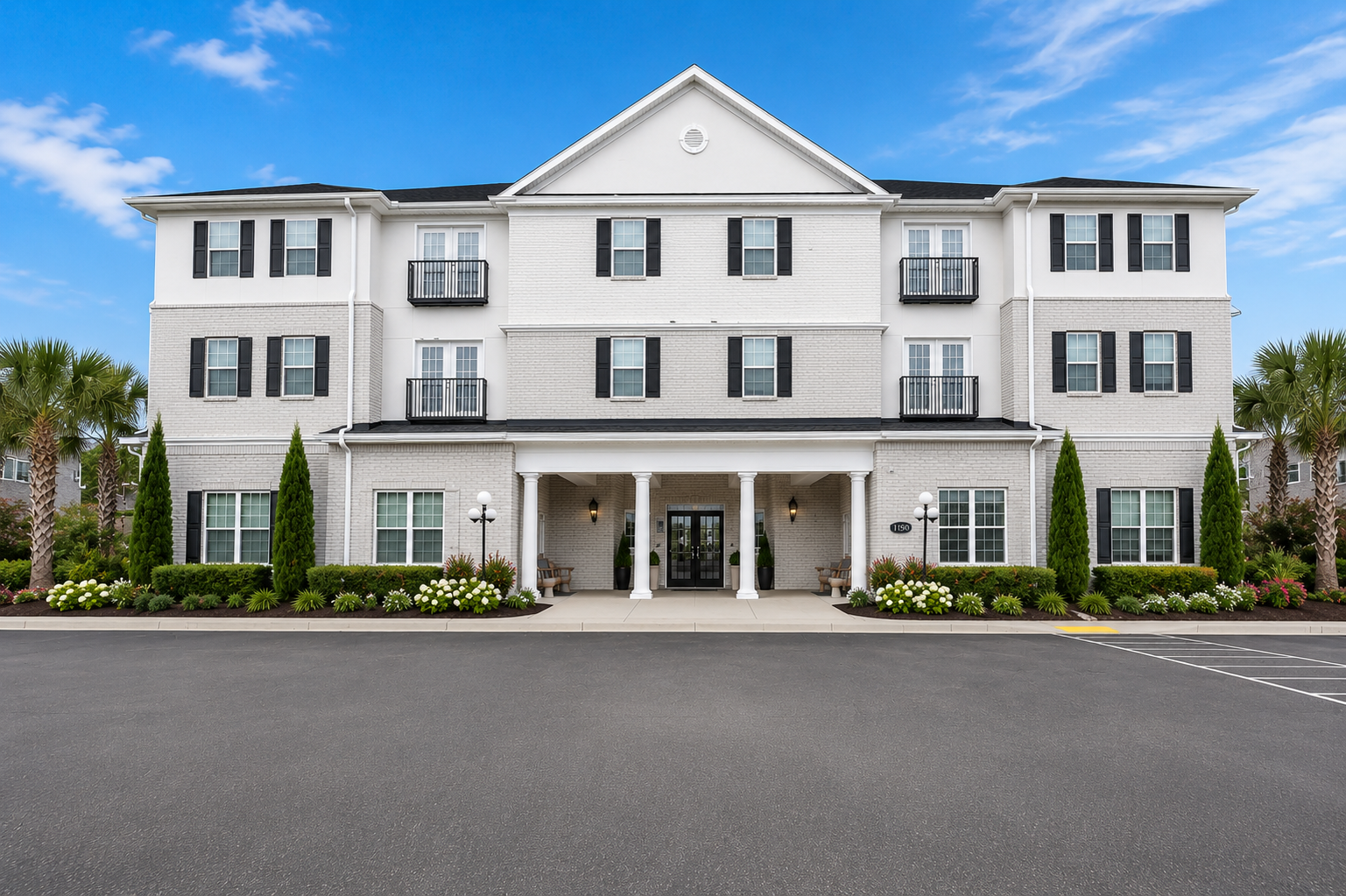 exterior view of white apartment building