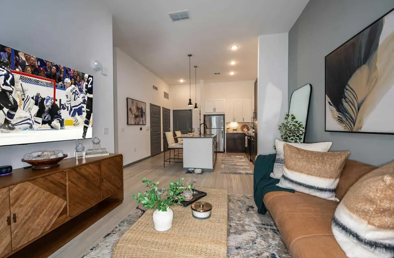 Interior image of living room leading into the kitchen